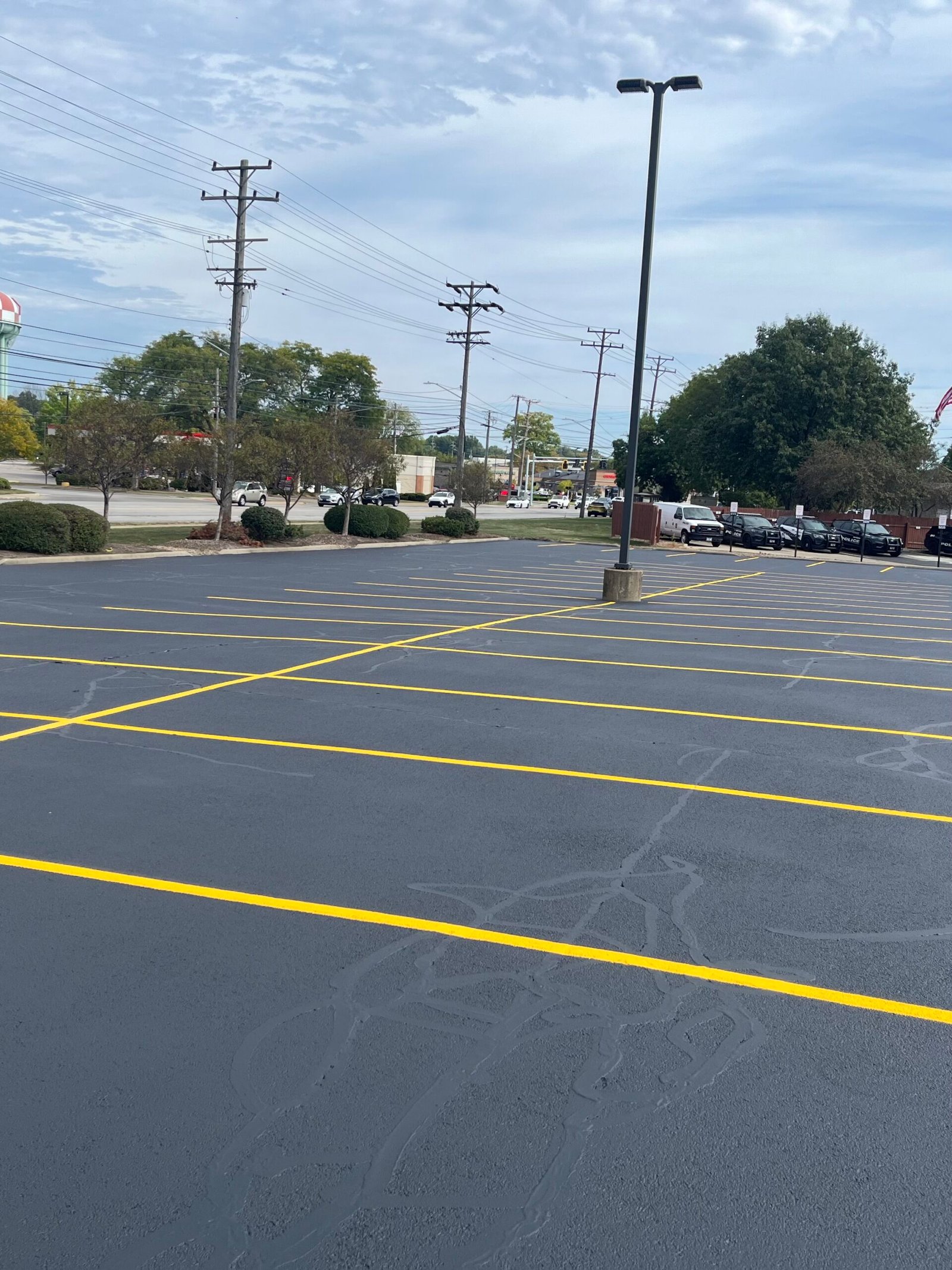 Asphalt Crack Sealing Sealcoating and striping project in North Olmsted Ohio
